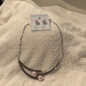 White House Black Market necklace with matching earnings.